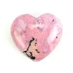 A highly polished rhodonite carved heart