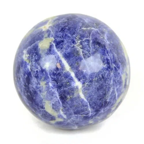 A highly polished sodalite carved sphere
