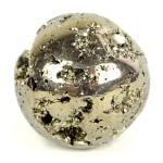 A highly polished pyrite carved sphere