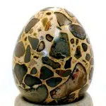 A highly polished, leopardite, carved egg