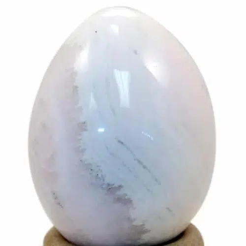 A highly polished, Mangano, carved egg