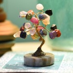 A stone tree with a bunch of different stones as leaves, the tree can be moved around to your liking.