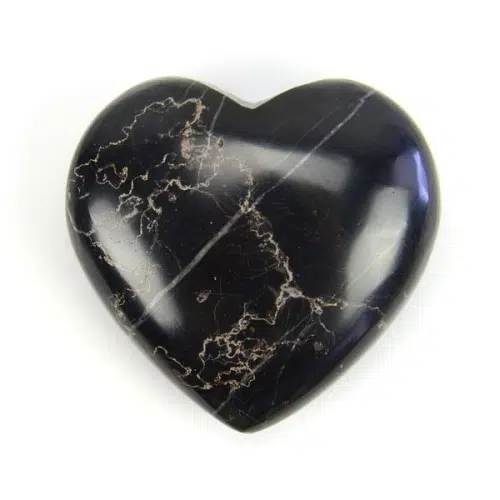 A highly polished black onyx carved heart