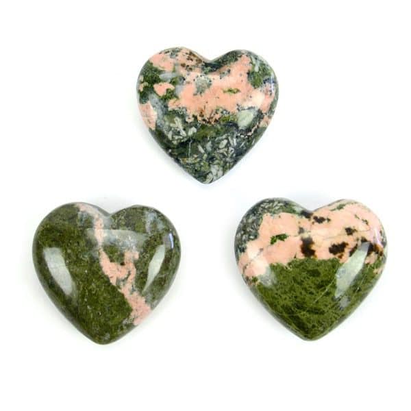 A highly polished unakite carved heart