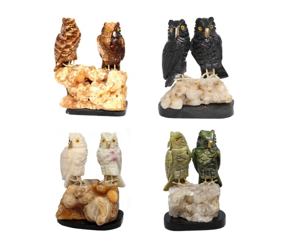 all four different colors of the semi precious stone owl pair, they come in the colors of, brown, black, white, and green.