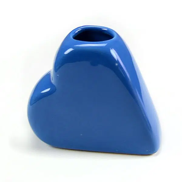 A small blue heart vase great for holding things
