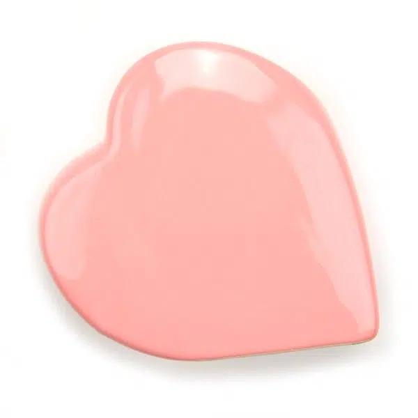 A pink vase shaped like a heart, great for holding things.