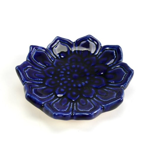 A small dish that is meant to have you keep your jewelry or other knick knacks.