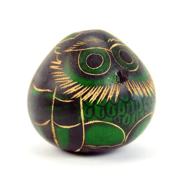 A close up of the green gourd owl ornament