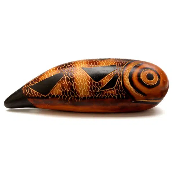 A gourd that has been carved to look like a fish