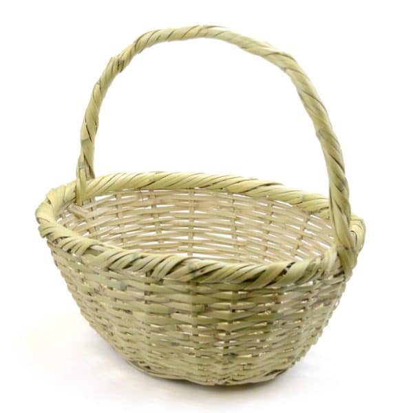 A straw basket that is meant to be taken to the market