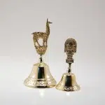 Bronze Bell with assorted shape handles.