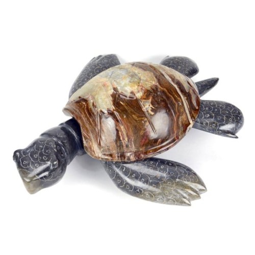A medium size turtle, made out of marble/onyx