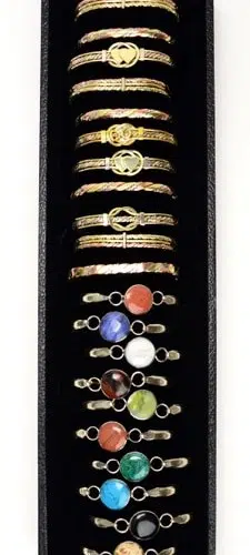 A bracelet tray letting you hold up to 21 bracelets per tray, has foam and leather on the inside