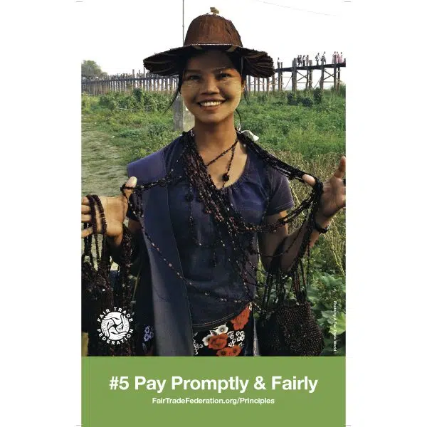 A poster set that tells you the rules to being a fair trade company this is number 5, pay promptly and fairly