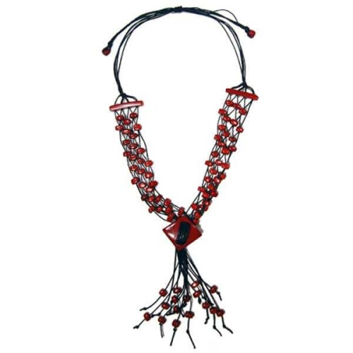 A picture of the tagua lattice necklace, made from tagua that has been hand carved and polished on a woven cotton cord.