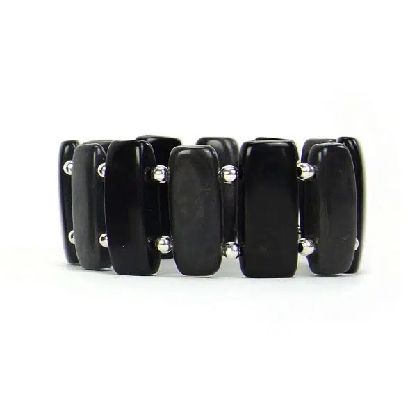 A Black colored bracelet that is approximately 1.25" tall.