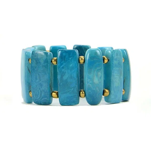 A turquoise colored bracelet that is approximately 1.25" tall.