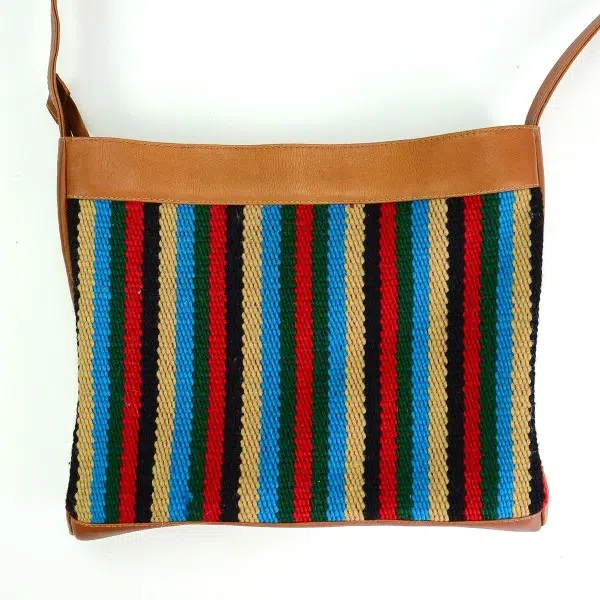 Tan leather crossbody bag with striped pattern accent