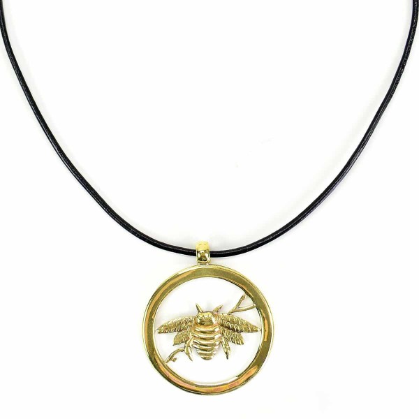 A close up picture of the golden bumblebee necklace.