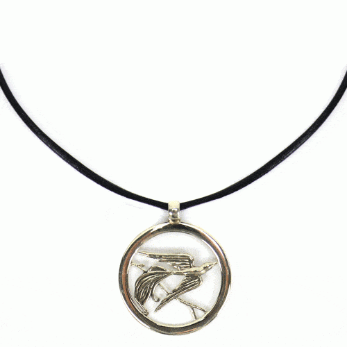 A close up picture of the silver songbird necklace.