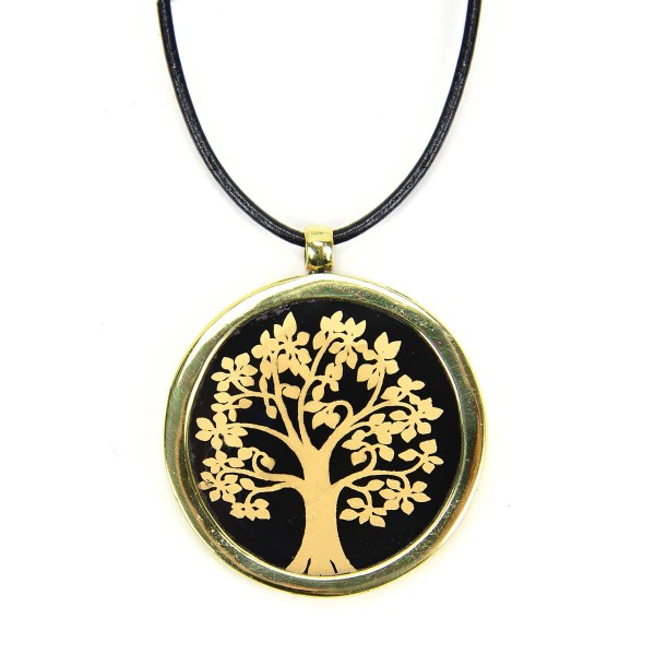 A picture of a golden necklace with a golden tree in the middle of it.