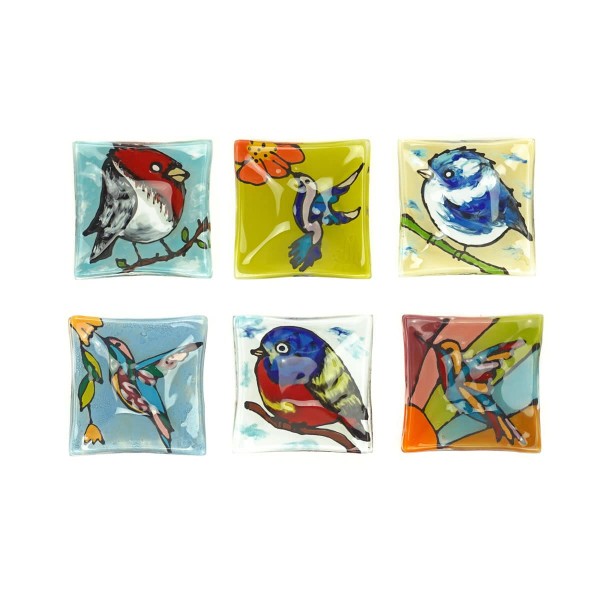 Six different glass dishes, all with different birds designs on it.