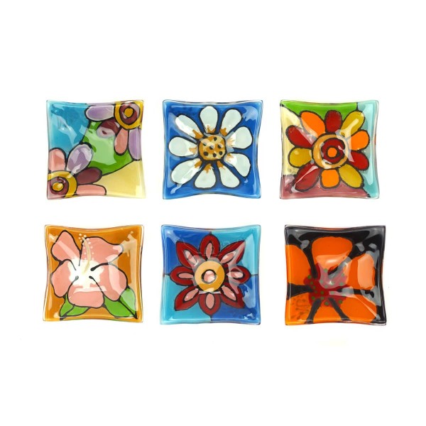 Six glass dishes with six different designs, all of them have some sort of flower on them.