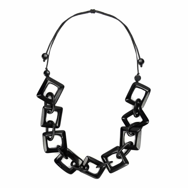 A close up picture of the camille necklace, in the color black.