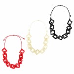 Three necklaces from the camille earrings, coming in a verity of colors, the colors in this picture are red, white, and black.