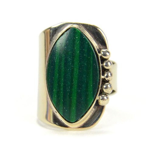 A close up picture of the green vessi ring.