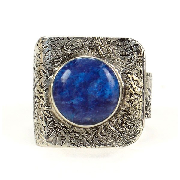 A close up picture of the blue hammered square ring.