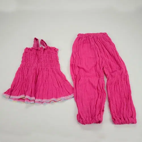 Pink dress and pants, both are made with cotton, both are also lightweight