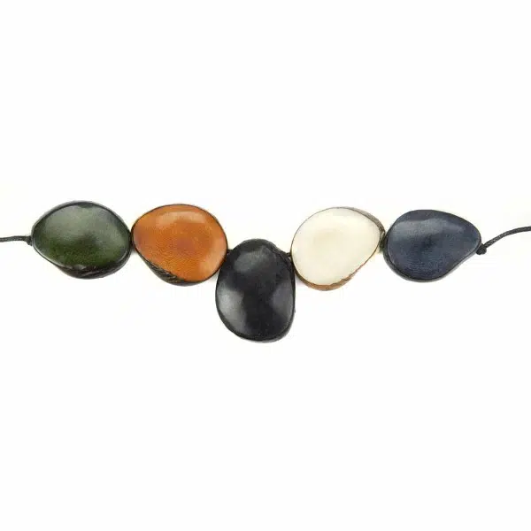 A picture of the forest theme for the cinco tagua necklace.