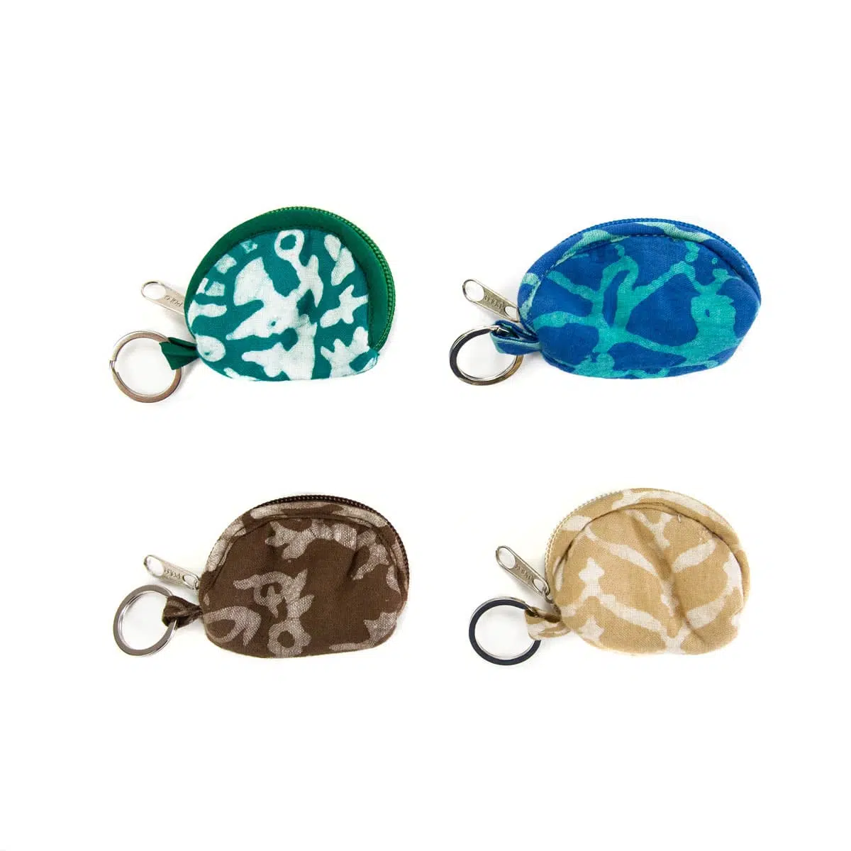group of four cotton purse keychain, the colors for these four key chains are blue, green,blue,brown,tan