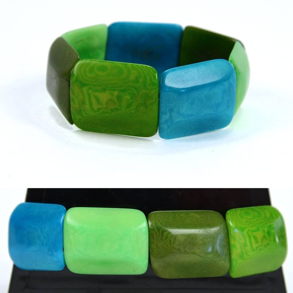Square tagua pieces put together to create a bracelet, coming in a verity of colors, this color is dark green, green, light green, and blue.