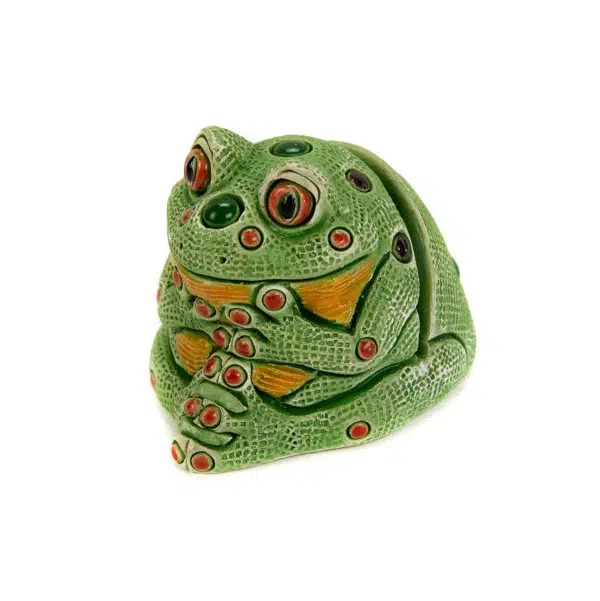 A ceramic card holder that looks like a frog.