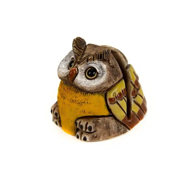 A ceramic card holder that looks like a owl.