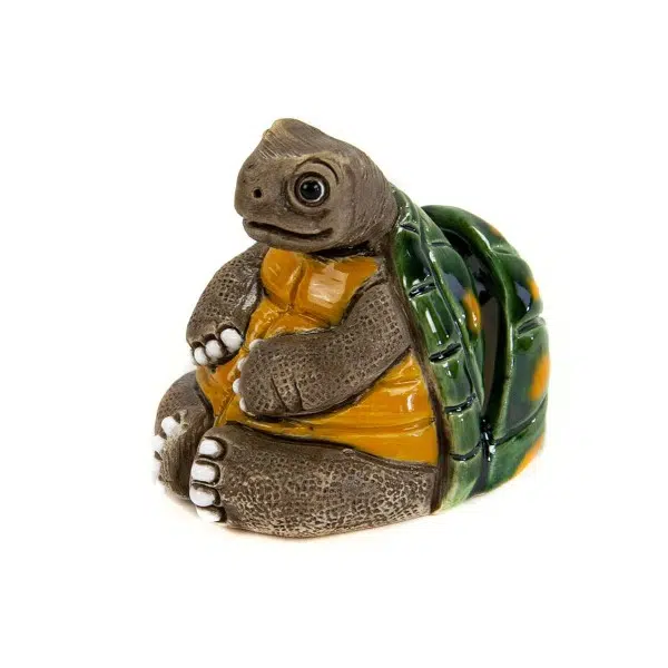 A ceramic card holder that looks like a turtle.
