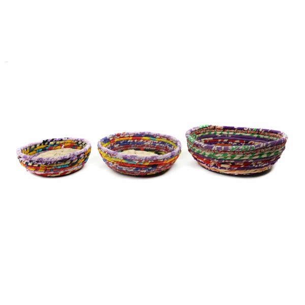 Round basket set made from woven straw wrapped in cotton saris