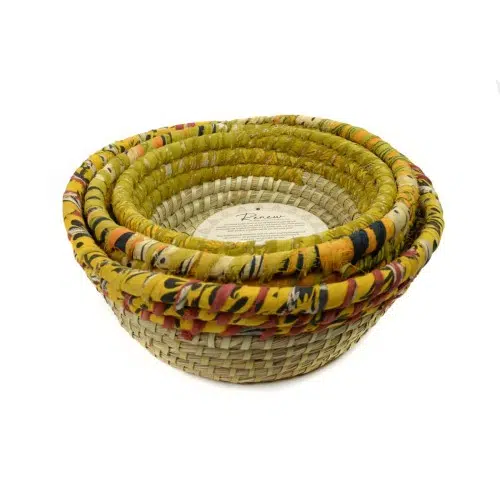 A side picture of the yellow sari palm leaf basket