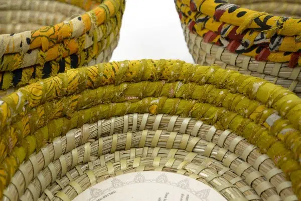 A super up close picture of the yellow sari palm leaf baskets