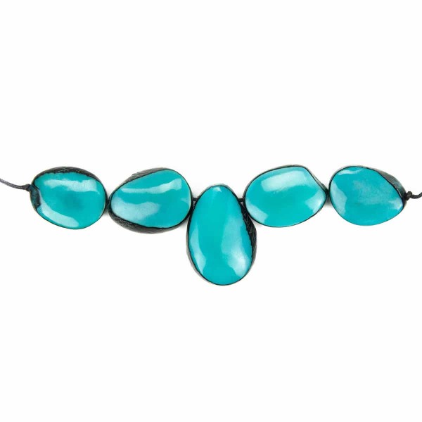 A picture of a sky blue cinco tagua necklace.