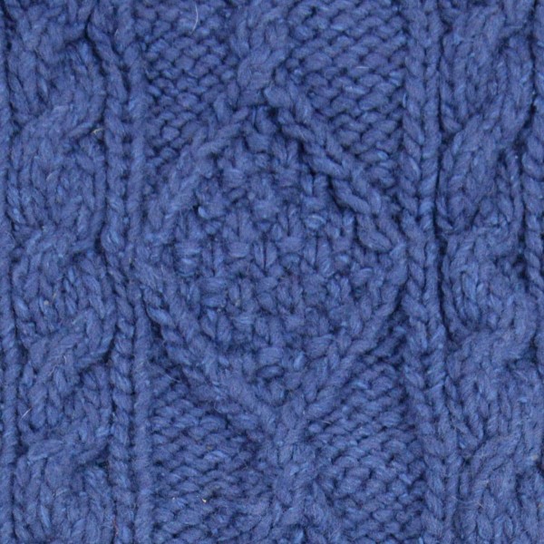 close up of the hand knit wool hat material, the color of this material is blue