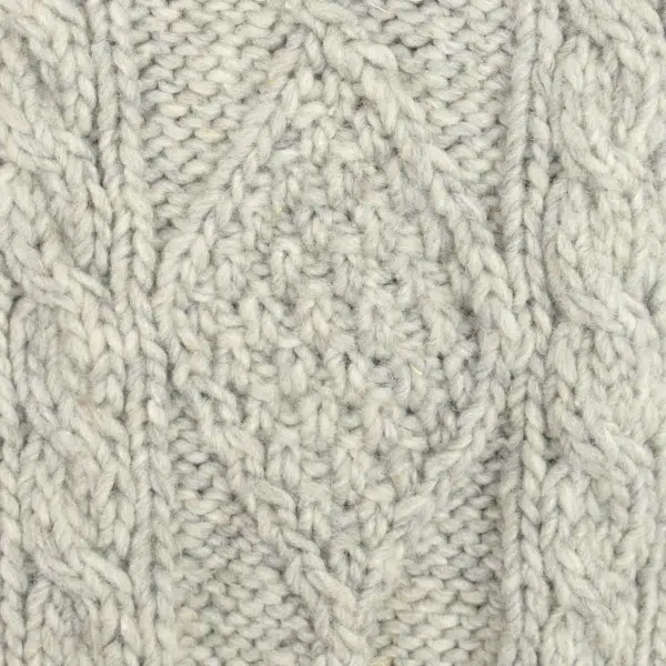 close up of the hand knit wool hat material, the color of this material is light grey