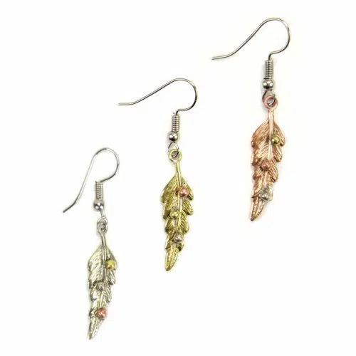 A picture of the long leaf earrings, comes in three different colors.