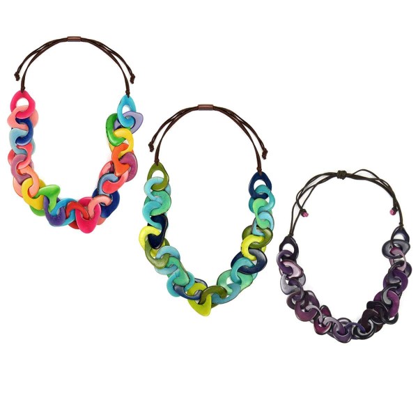 A picture of three different colored cadena necklaces, those colors are, multi, aqua, and purple.