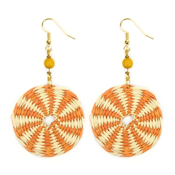 A close up picture of the disco straw earrings, comes in a verity of colors, this colors is orange and white.