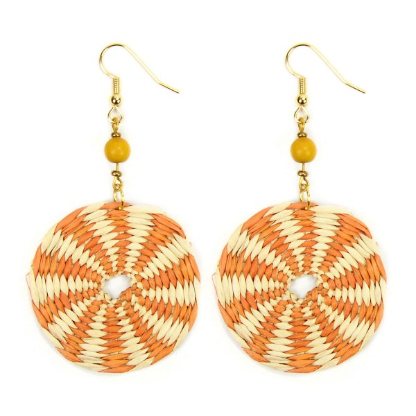 A close up picture of the disco straw earrings, comes in a verity of colors, this colors is orange and white.