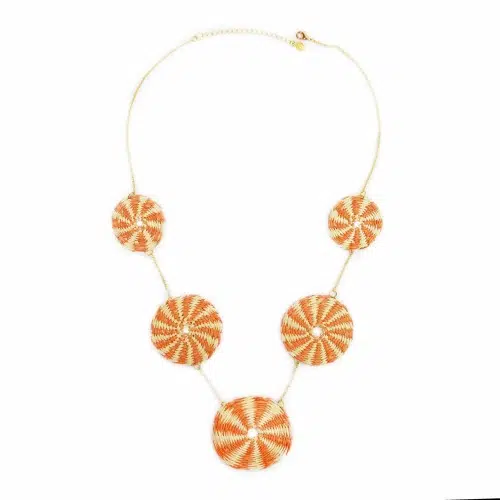 Woven straw circles added on a chain to make this necklace, the straw circles come in a verity of colors. The color in this picture is orange.